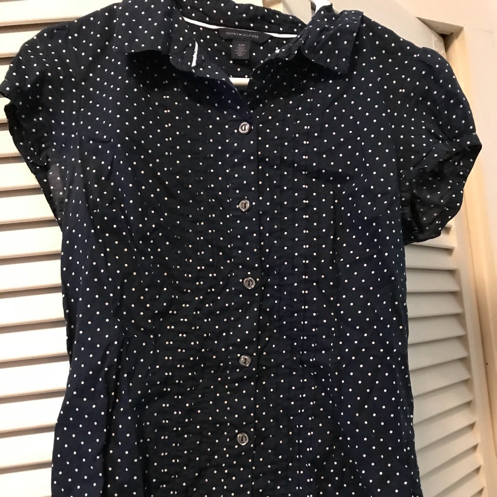 Short sleeve button down polka dot shirt.